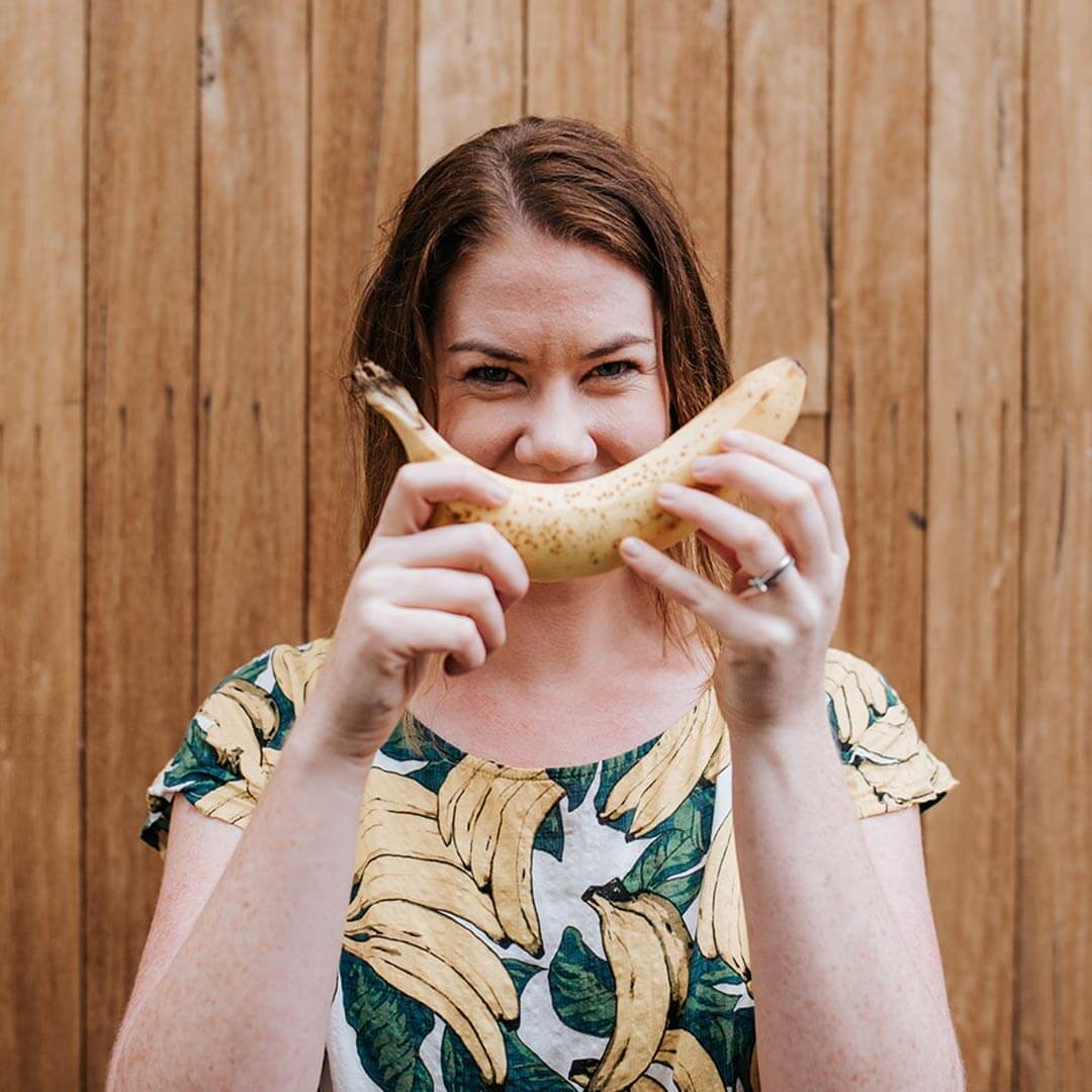Melissa Finlay, hiding behind a banana